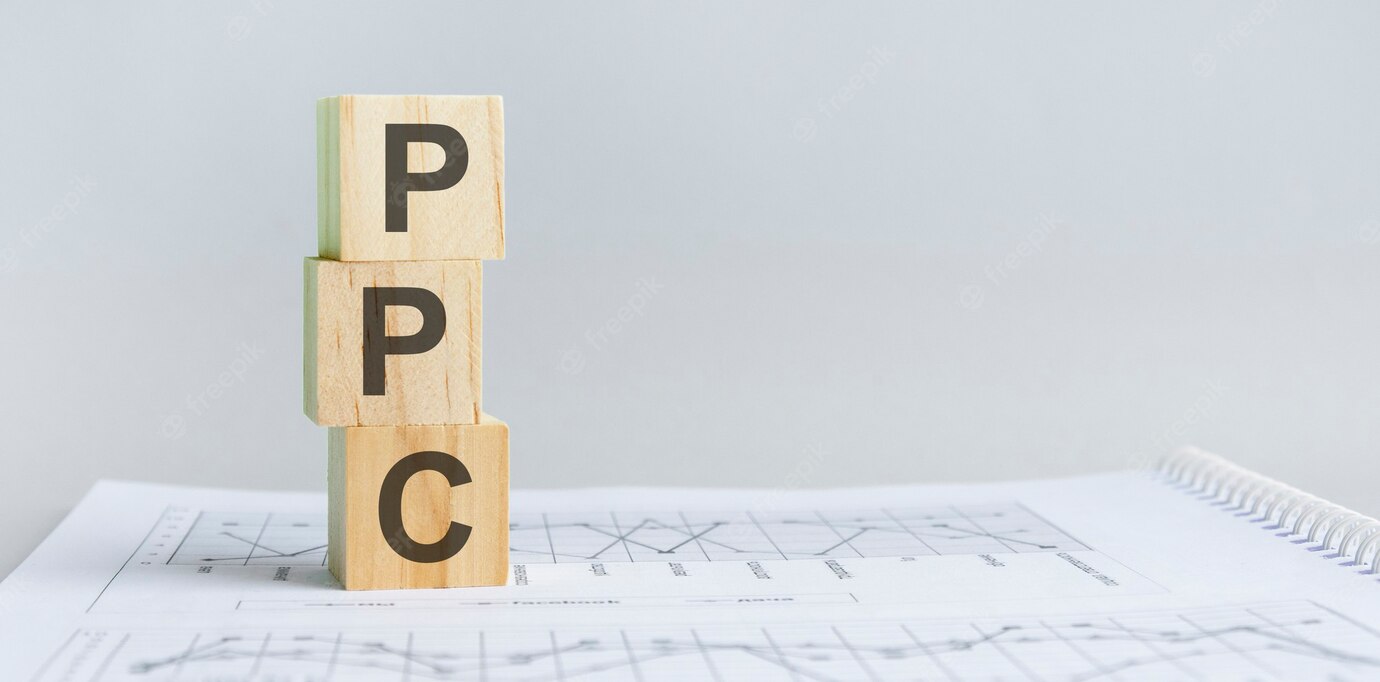 ppc-pay-per-click-acronym-wooden-blocks-business-concept-gray-background_384017-3377