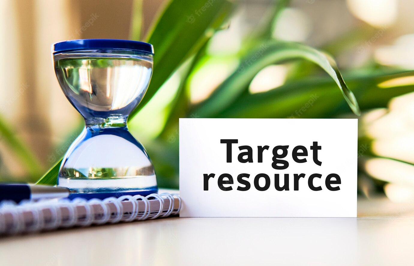 target-resource-text-white-notebook-hourglass-clock